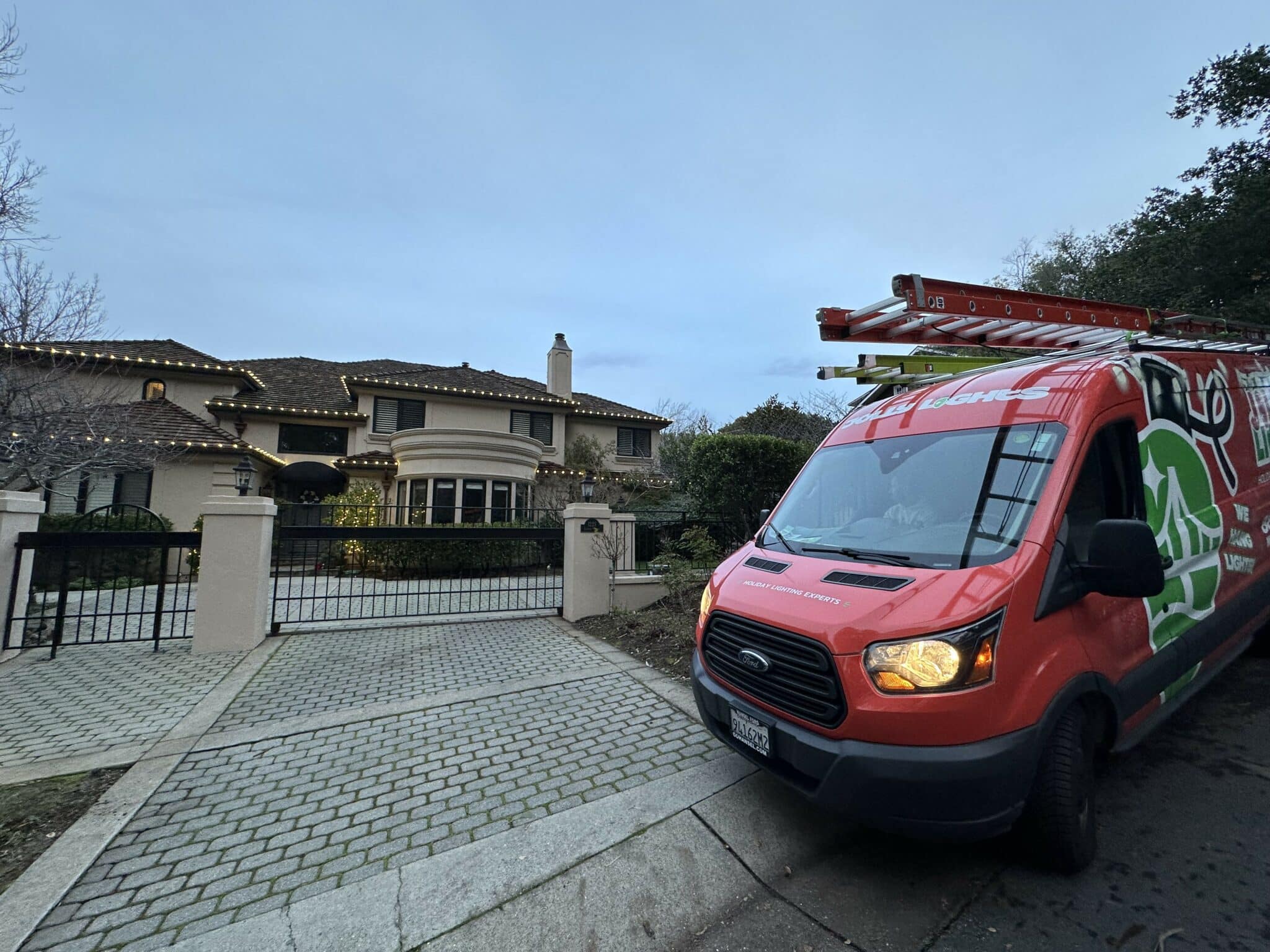 Hillsborough CA Red Christmas Lights Van and installation on beautiful custom home